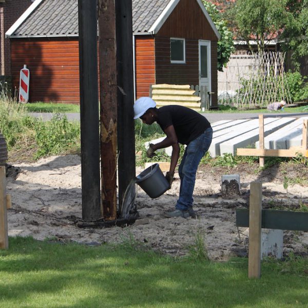 Houten palen in Krommenie SPS